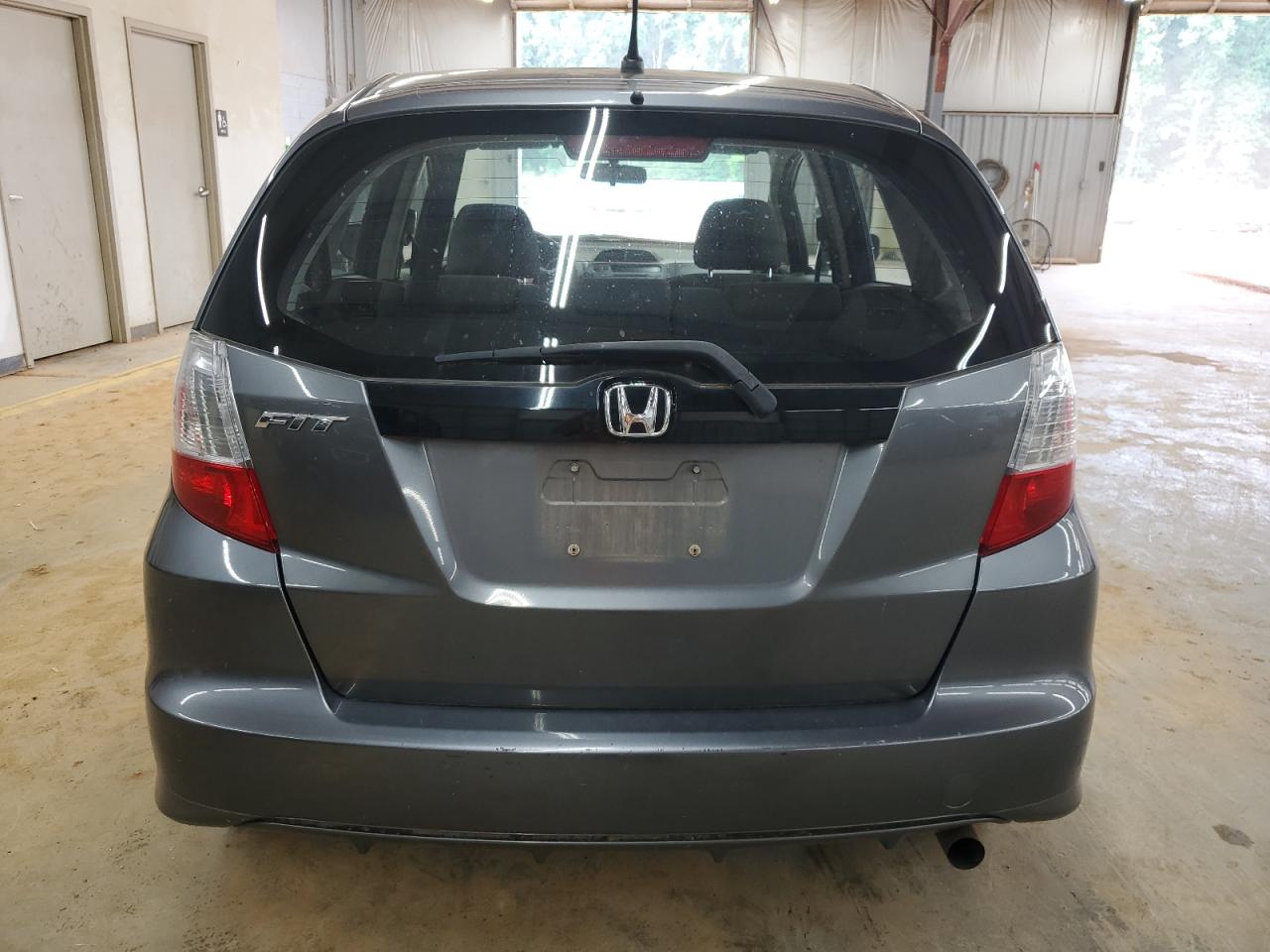 2012 Honda Fit VIN: JHMGE8H30CC036074 Lot: 63121895