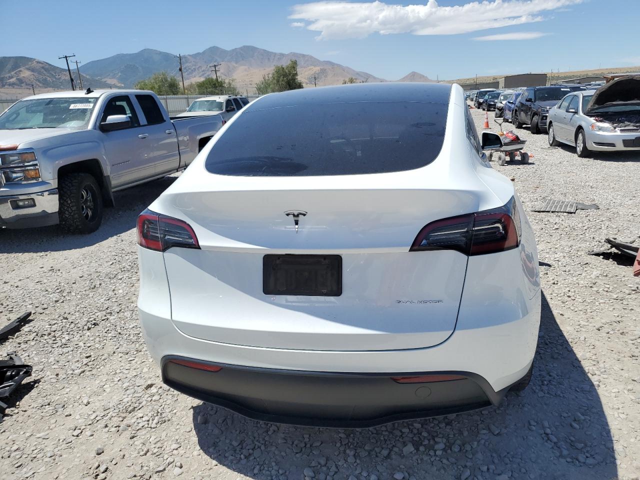 2023 Tesla Model Y VIN: 7SAYGDEE1PF604021 Lot: 66705445
