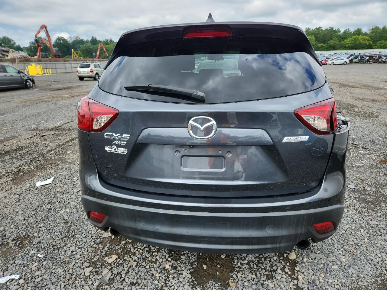 2014 Mazda Cx-5 Touring VIN: JM3KE4CY8E0324847 Lot: 64118075