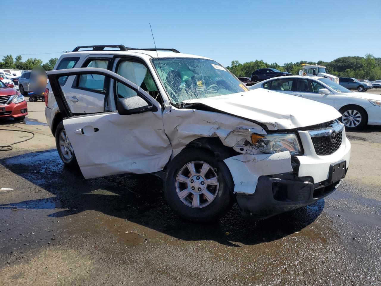 2010 Mazda Tribute I VIN: 4F2CY9C71AKM04921 Lot: 65505725