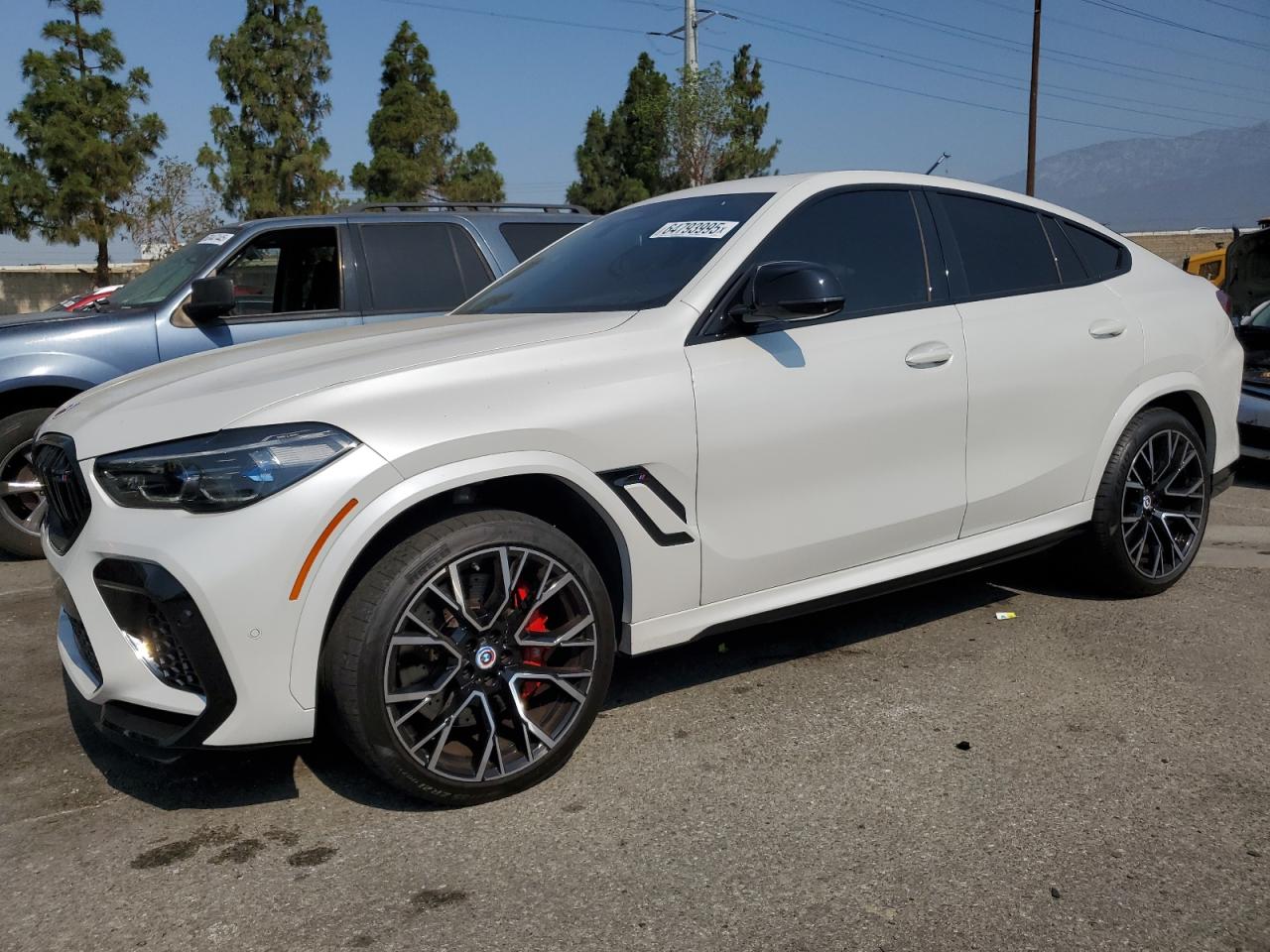 2022 BMW X6 M VIN: 5YMCY0C01N9M56990 Lot: 64793995