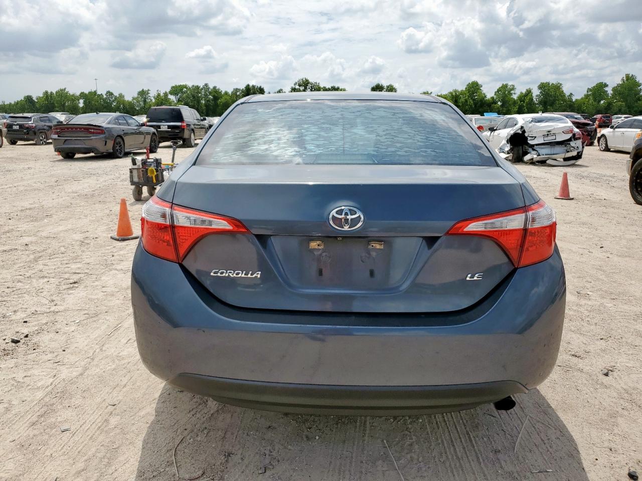 2016 Toyota Corolla L VIN: 5YFBURHE1GP380810 Lot: 65087655