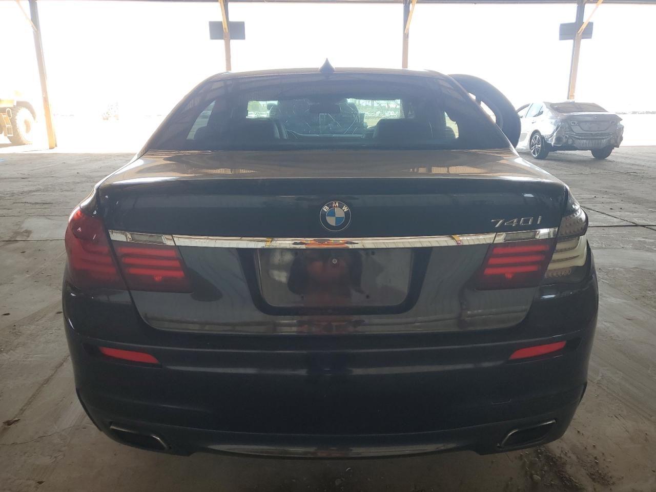 2015 BMW 740 I VIN: WBAYA6C55FD826819 Lot: 64291795