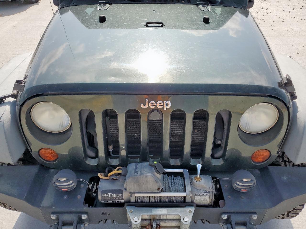 2011 Jeep Wrangler Sport VIN: 1J4AA2D10BL573699 Lot: 65088005