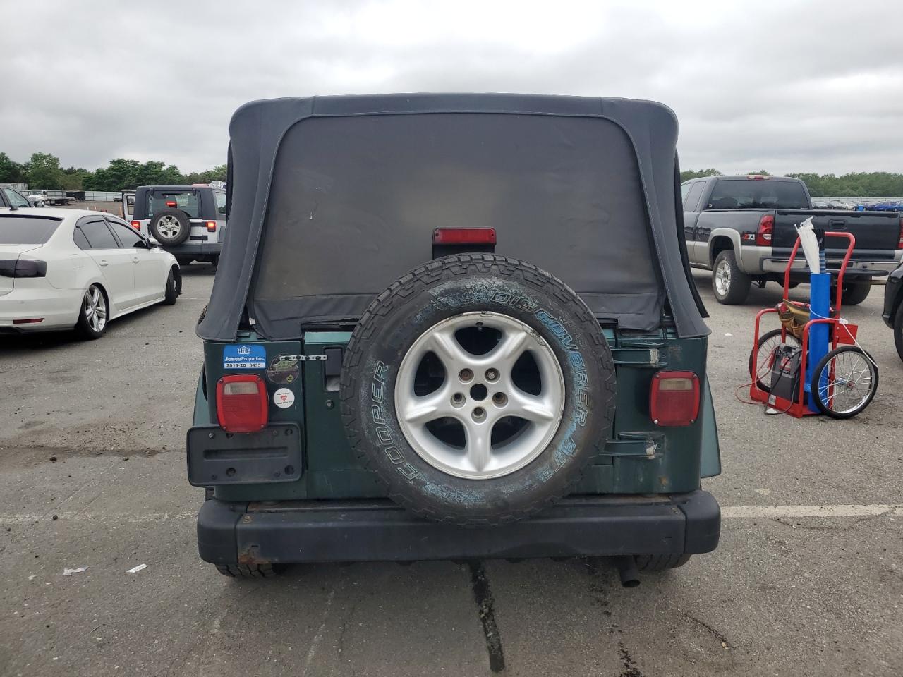 2001 Jeep Wrangler / Tj Sahara VIN: 1J4FA59S21P349009 Lot: 64310995