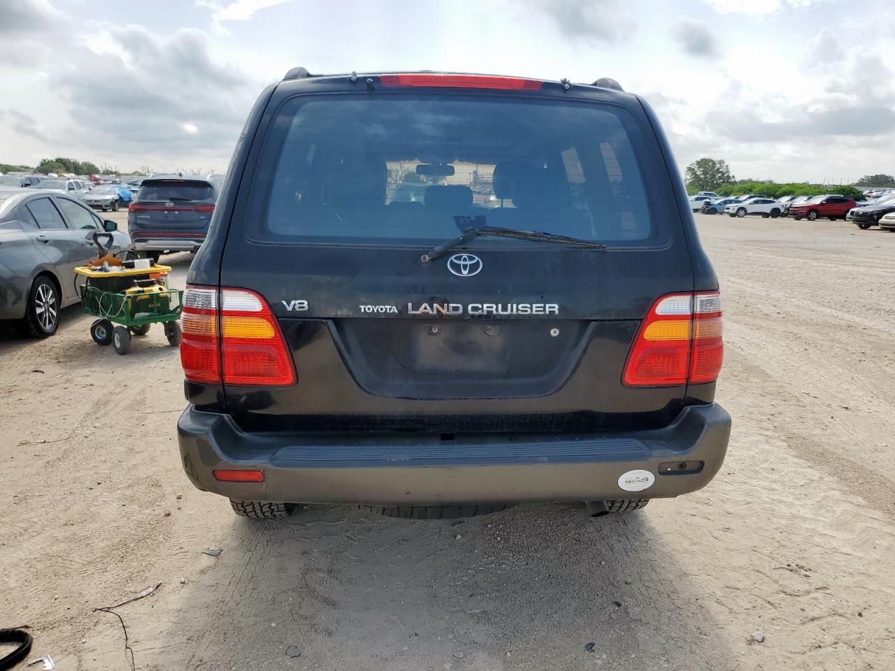 1999 Toyota Land Cruiser VIN: JT3HT05J7X0047293 Lot: 60870585