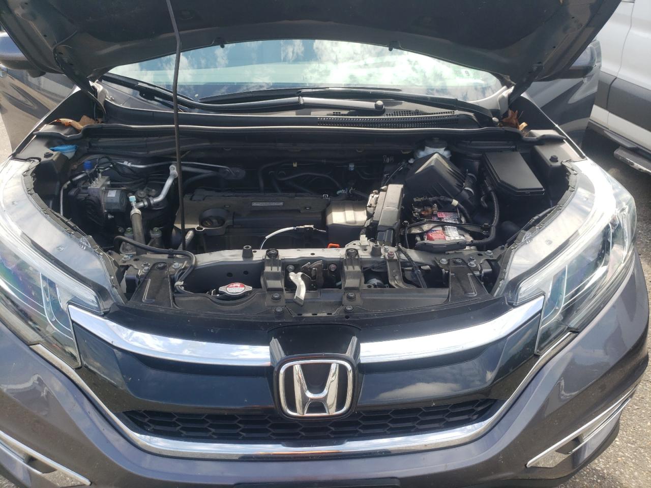 2016 Honda Cr-V Exl VIN: 2HKRM4H7XGH697453 Lot: 65418995