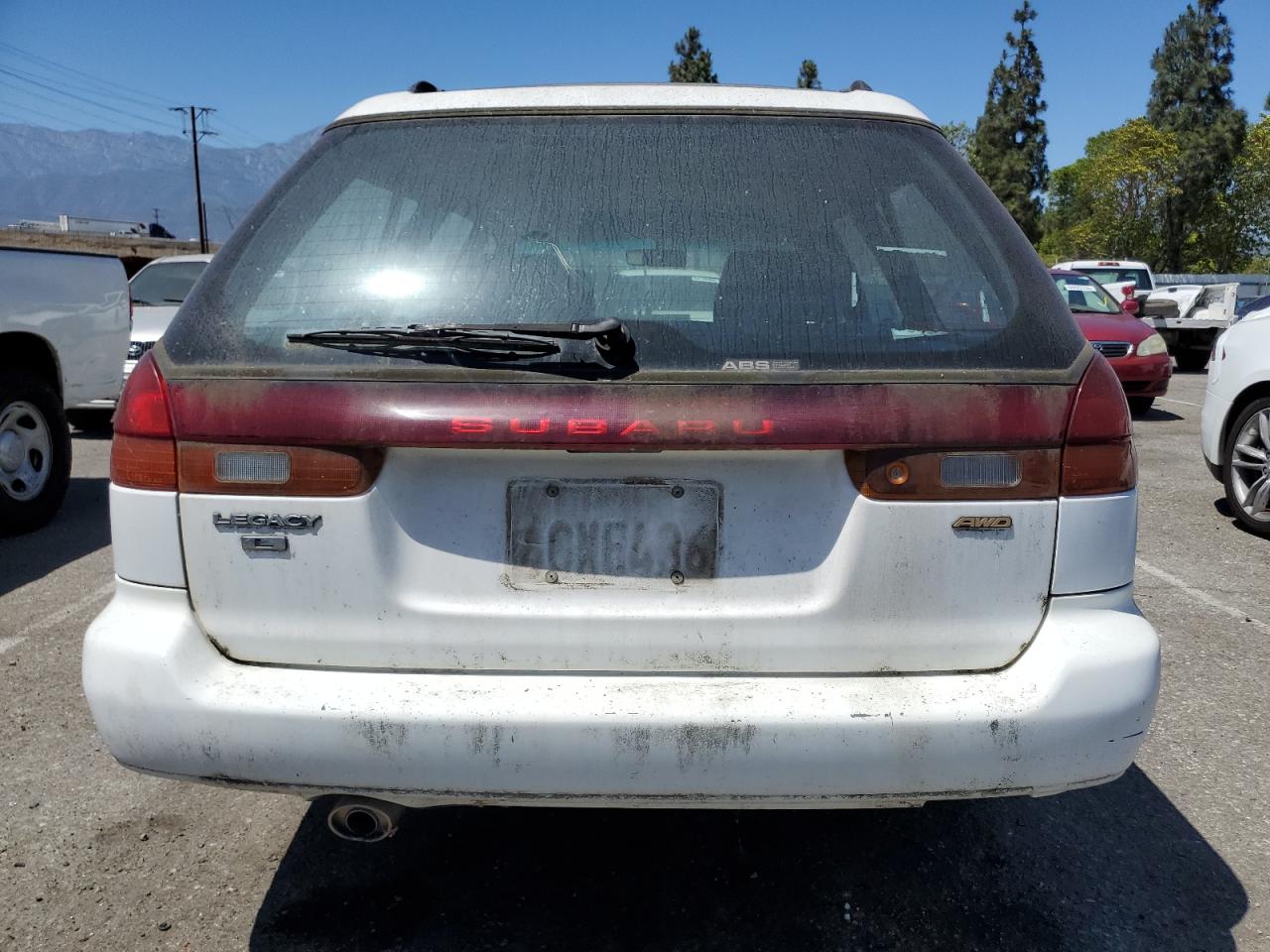 1999 Subaru Legacy L VIN: 4S3BK4353X6303153 Lot: 63945205