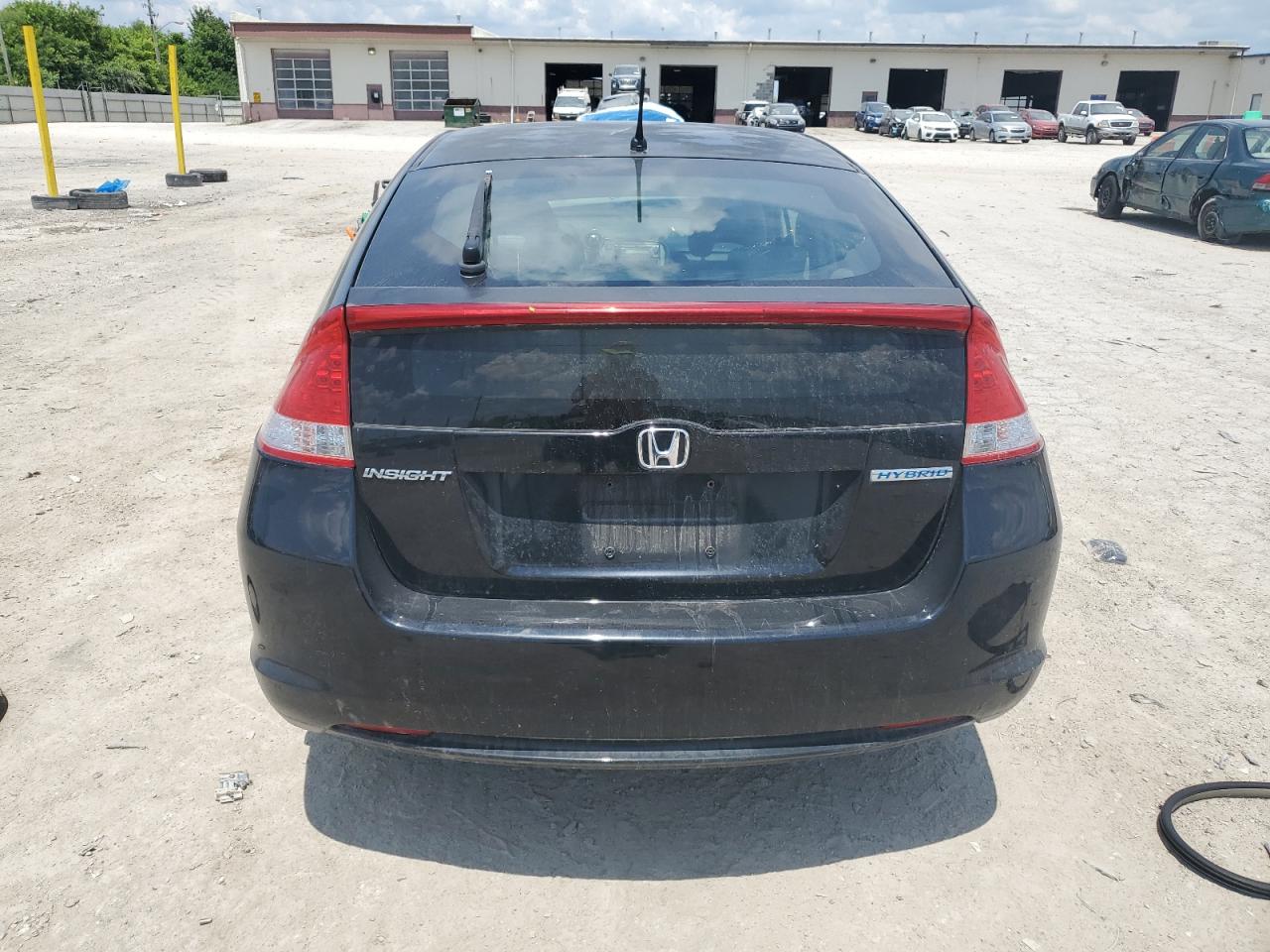 2011 Honda Insight VIN: JHMZE2H34BS001595 Lot: 63970425