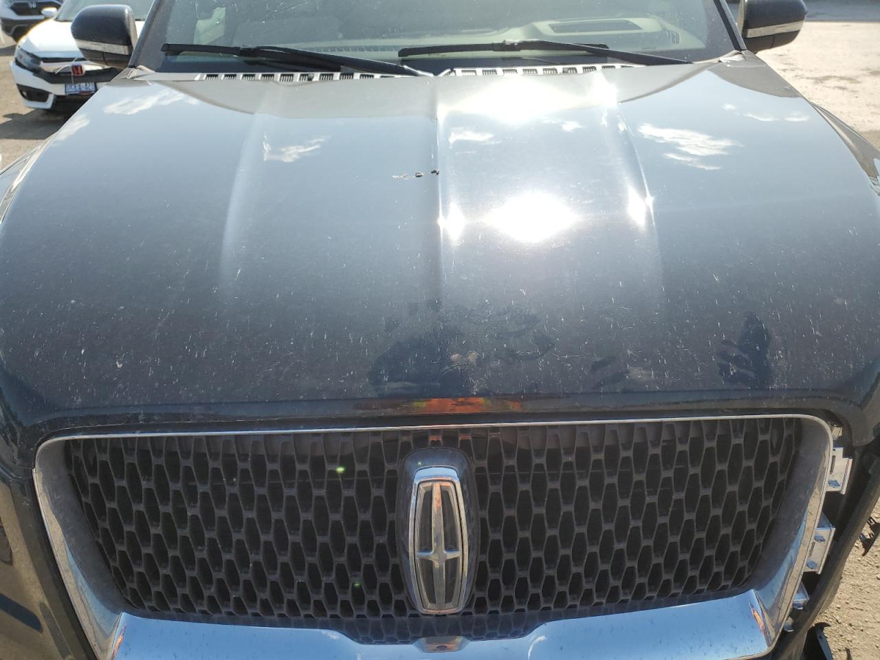 2024 Lincoln Navigator L Reserve VIN: 5LMJJ3LG6REL11310 Lot: 63293385