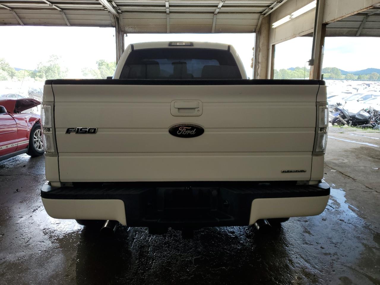 2011 Ford F150 VIN: 1FTMF1EFXBFD06755 Lot: 65024235