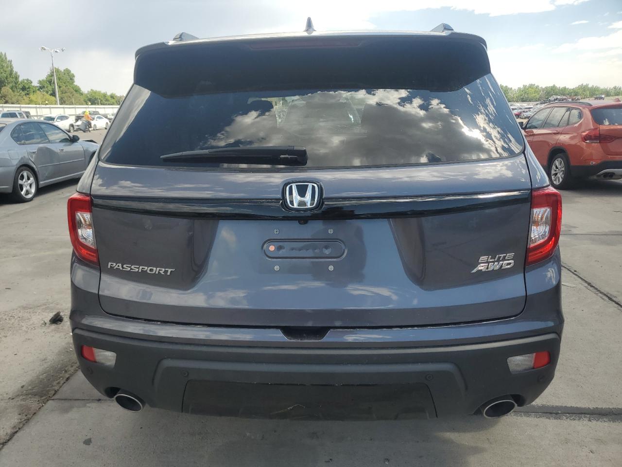 2021 Honda Passport Elite VIN: 5FNYF8H00MB039330 Lot: 64429825