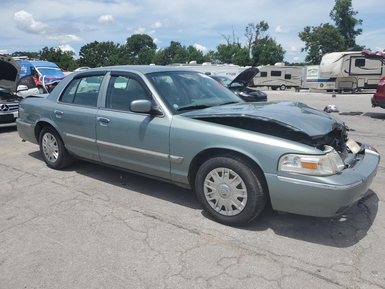 2006 Mercury Grand Marquis Gs VIN: 2MEFM74V16X613542 Lot: 64176385
