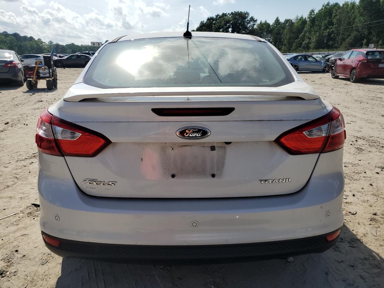 2014 Ford Focus Titanium VIN: 1FADP3J28EL179267 Lot: 65359335