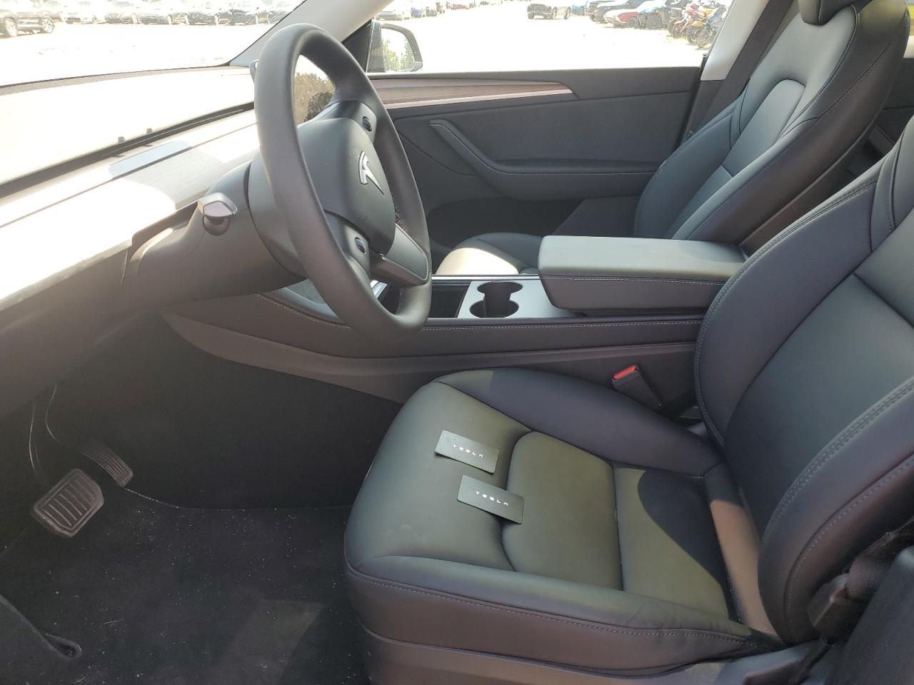 2023 Tesla Model Y VIN: 7SAYGDEE7PA174623 Lot: 66641805