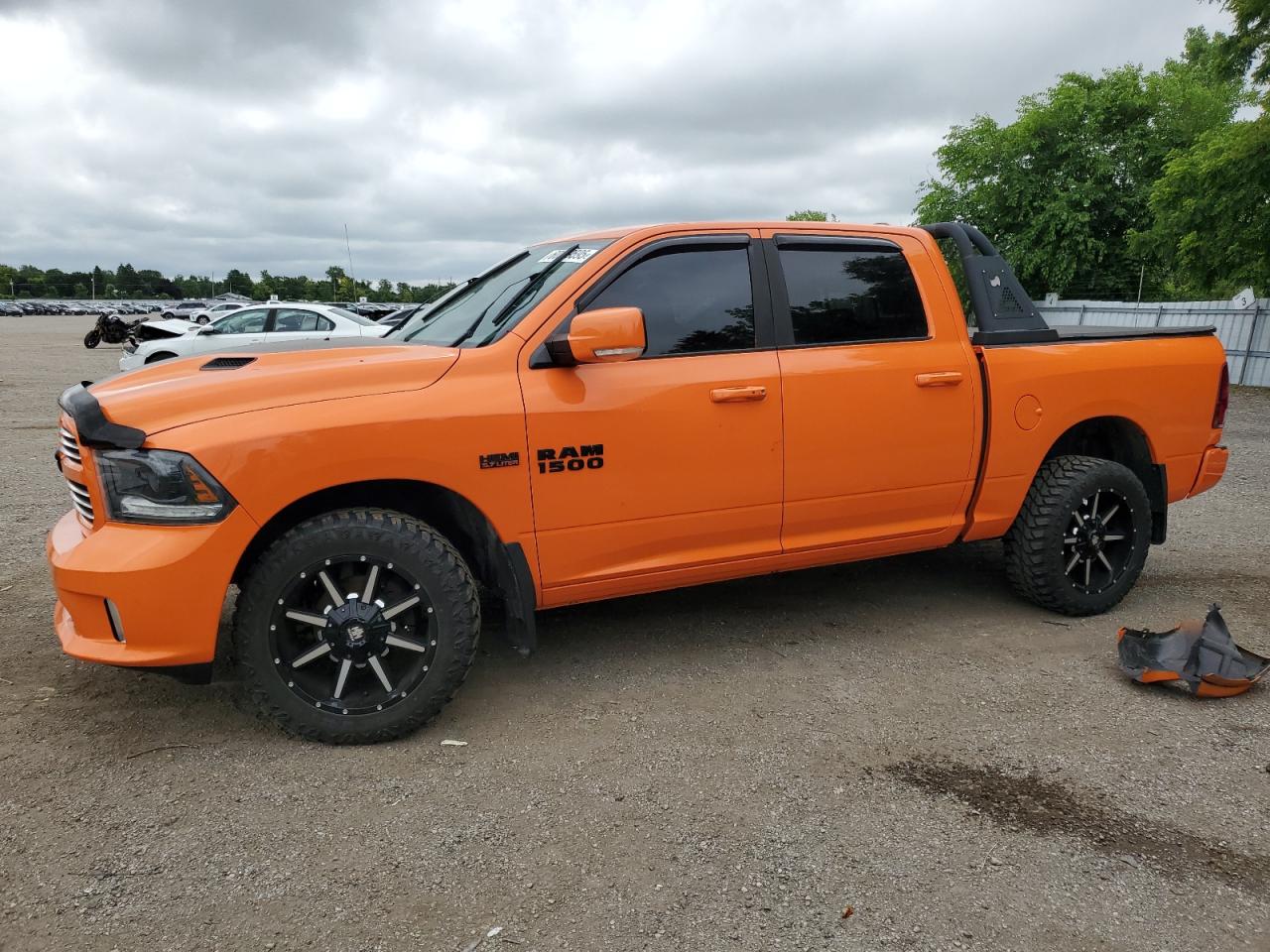 2015 Ram 1500 Sport orange null gas 1C6RR7MT2FS701458 photo #1