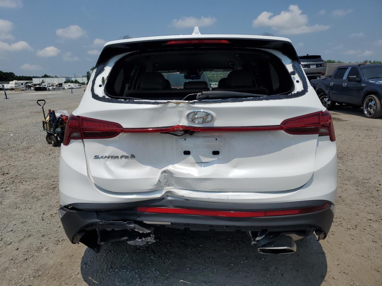 2021 Hyundai Santa Fe Sel VIN: 5NMS24AJXMH335614 Lot: 63979405