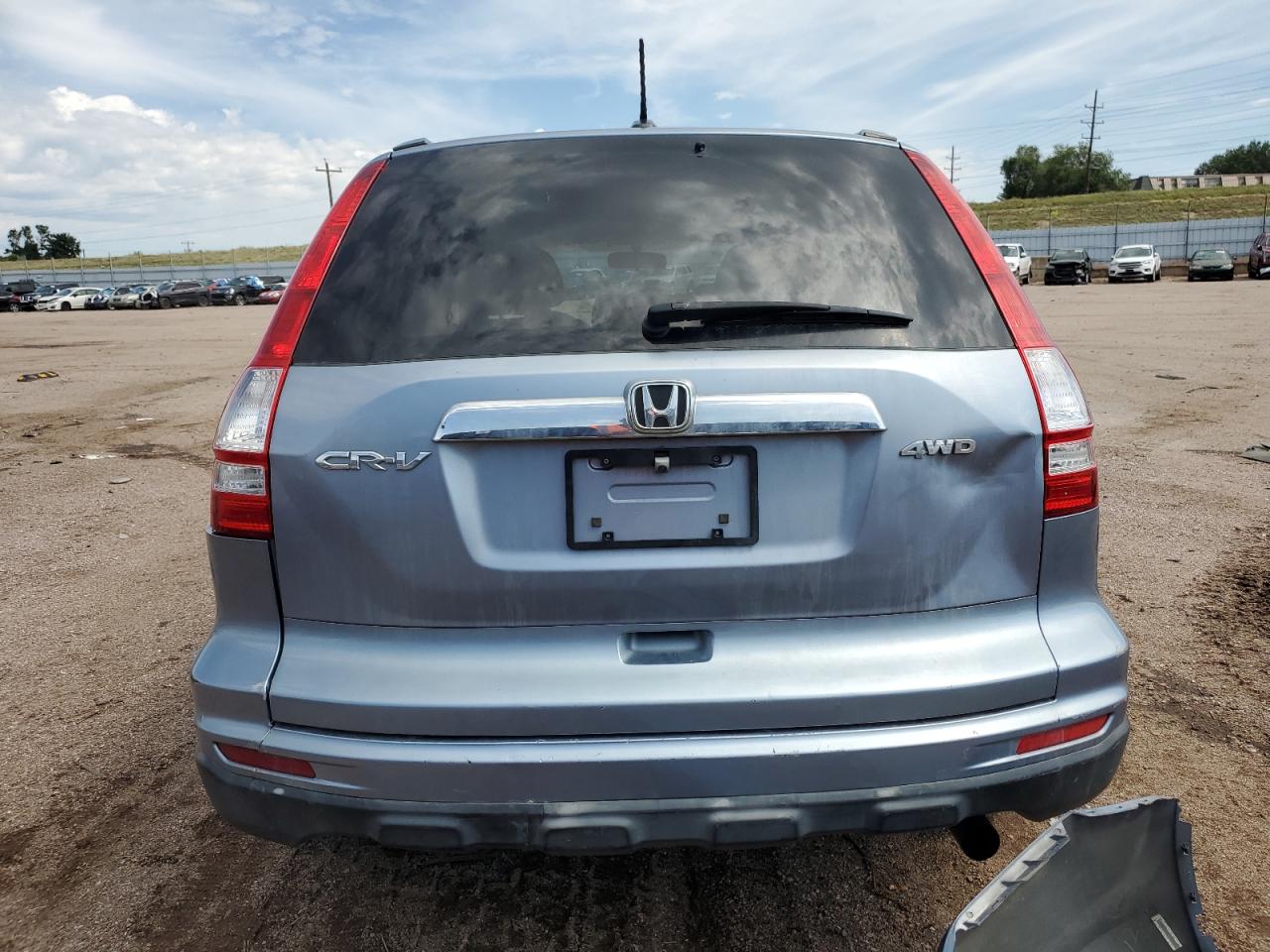 2010 Honda Cr-V Exl VIN: JHLRE4H76AC013064 Lot: 66238275