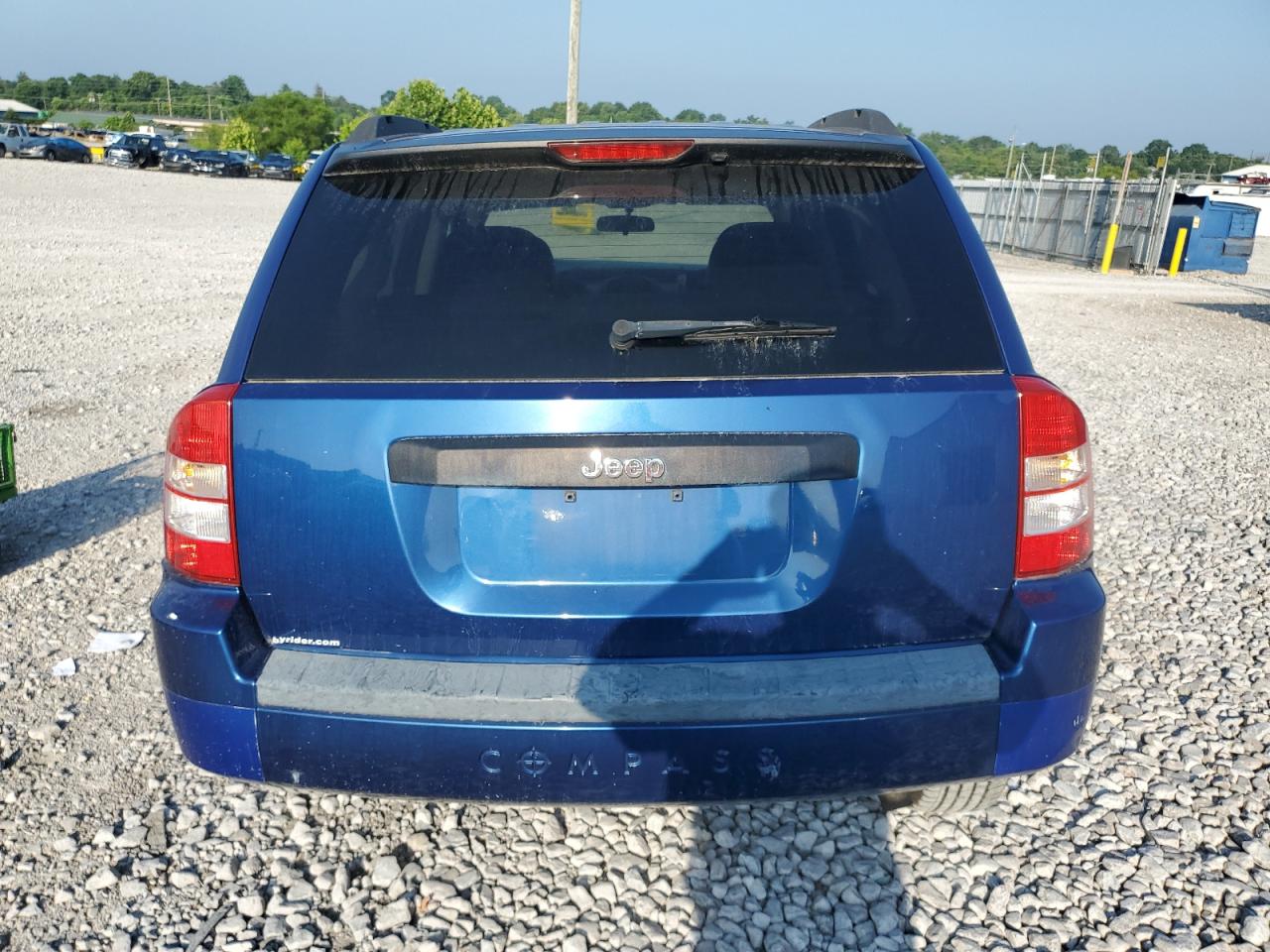2009 Jeep Compass Sport VIN: 1J4FT47AX9D124493 Lot: 63558905