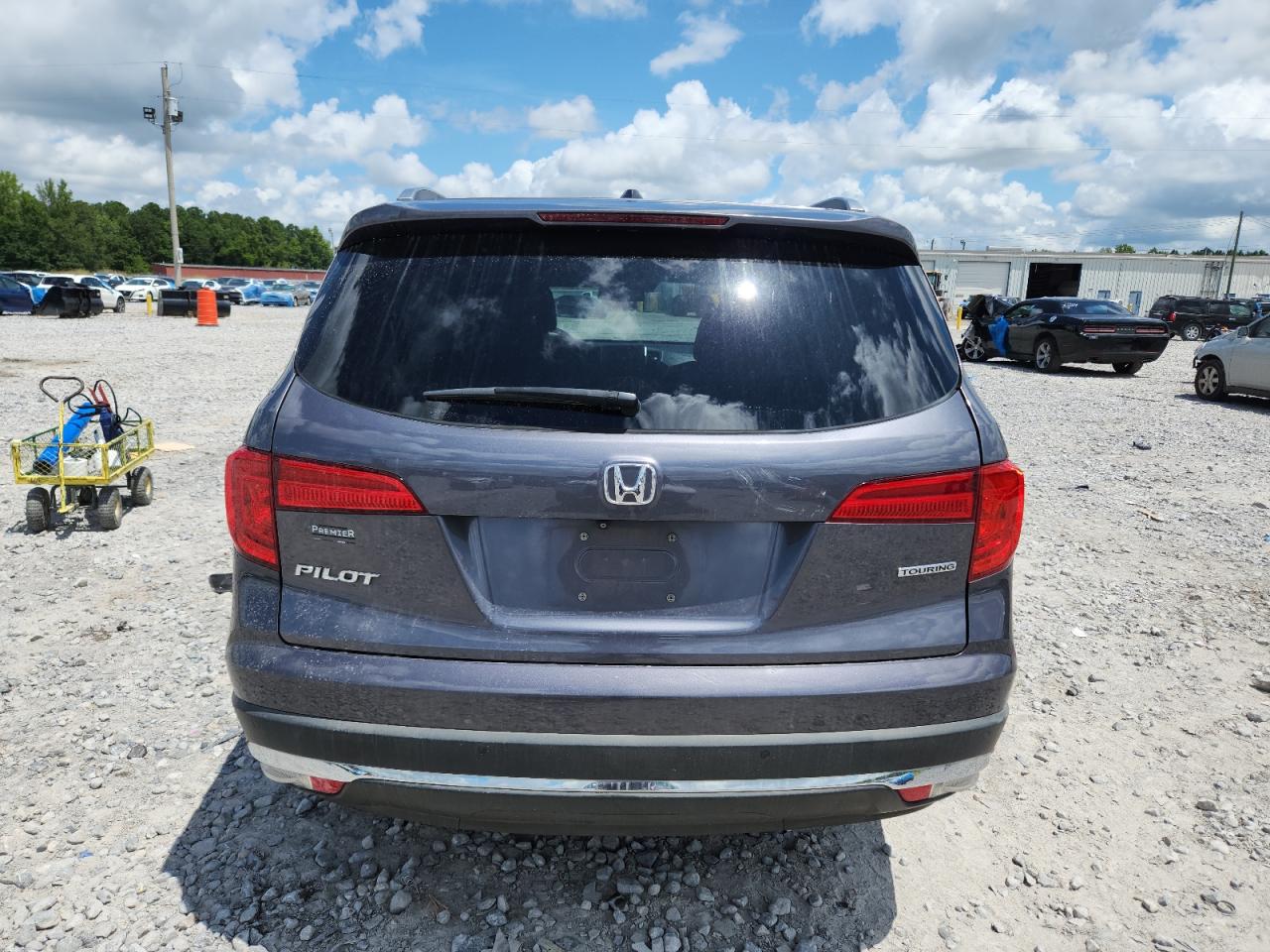 2018 Honda Pilot Touring VIN: 5FNYF5H99JB012779 Lot: 64201545