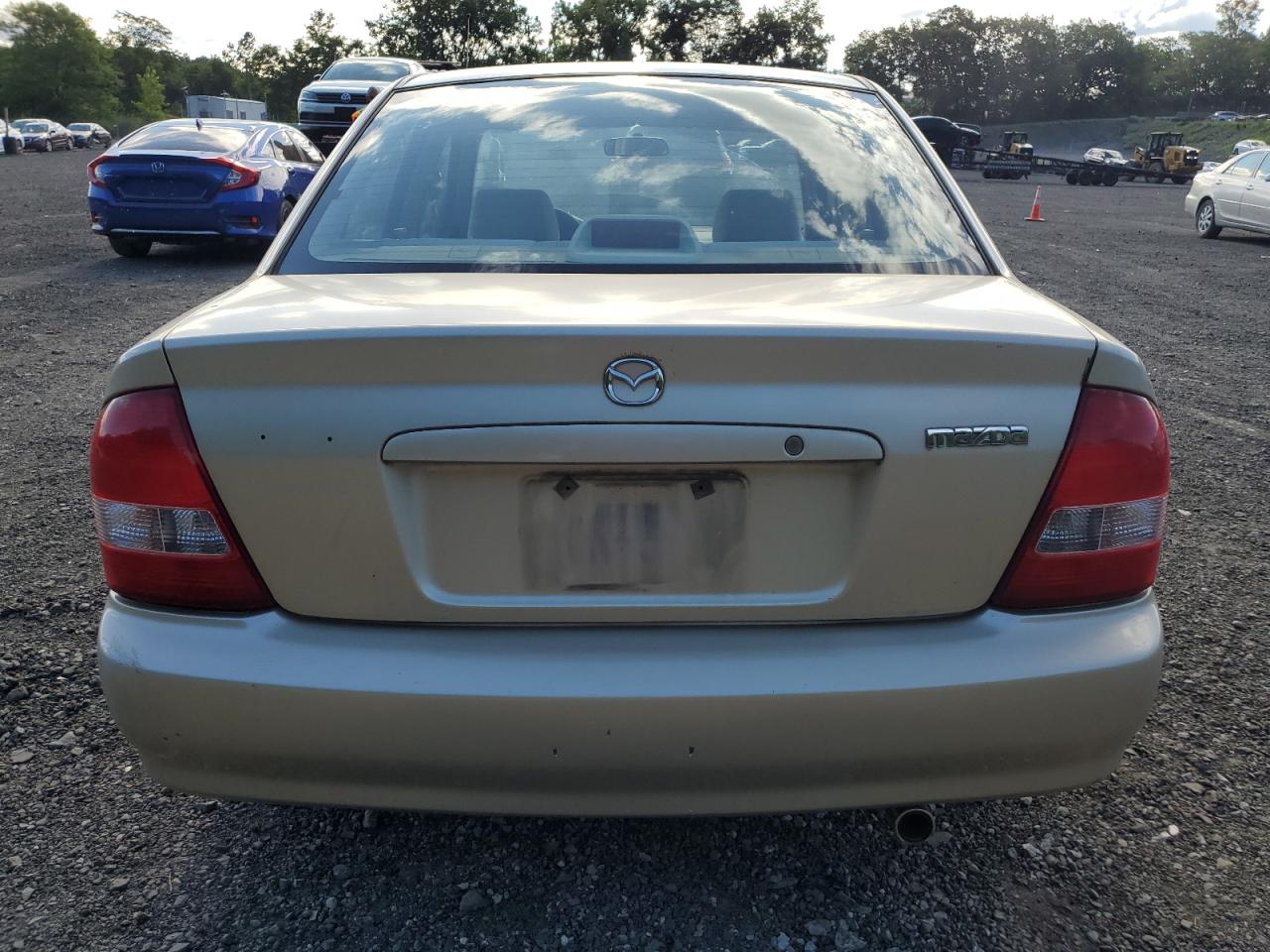 2001 Mazda Protege Dx VIN: JM1BJ222710440671 Lot: 65161515