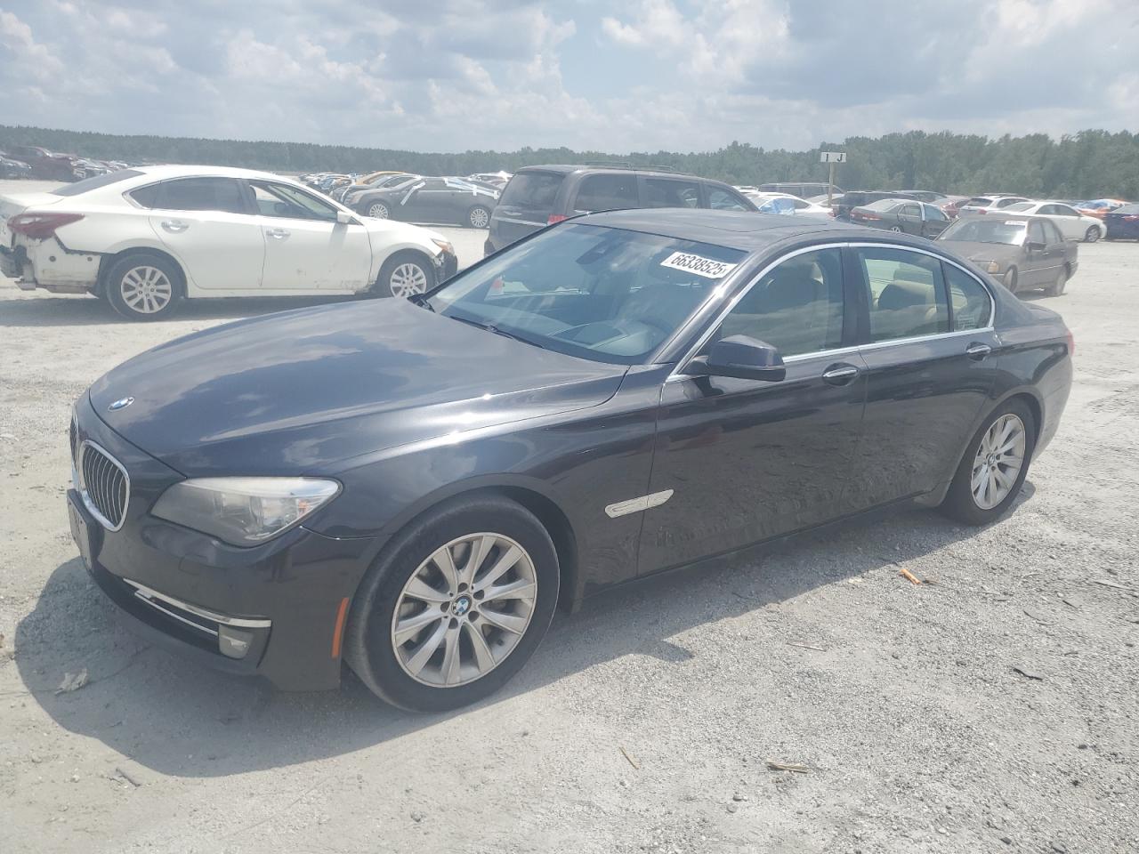 2014 BMW 740 I VIN: WBAYA6C58ED826649 Lot: 66338525