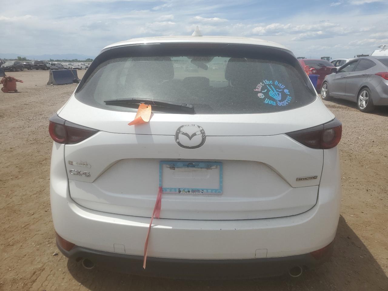 2021 Mazda Cx-5 Sport VIN: JM3KFABM7M1306455 Lot: 66111365