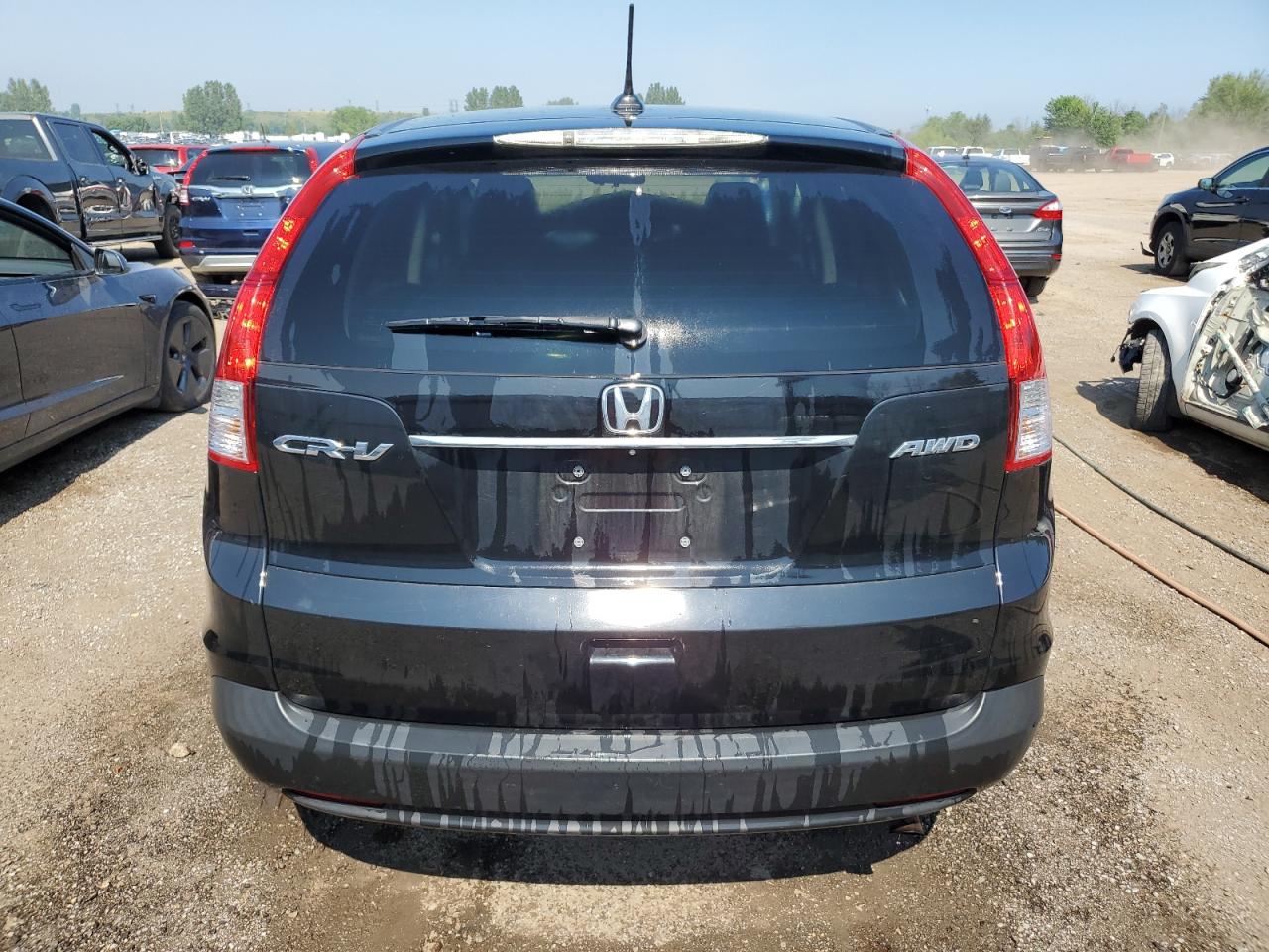 2014 Honda Cr-V Exl VIN: 2HKRM4H79EH132334 Lot: 63912435