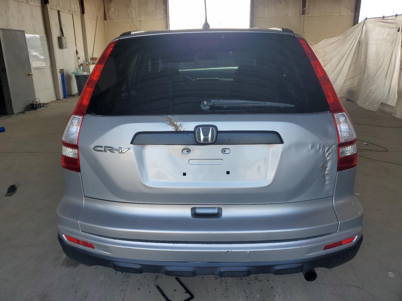 2010 Honda Cr-V Lx VIN: 3CZRE3H3XAG703654 Lot: 65995605