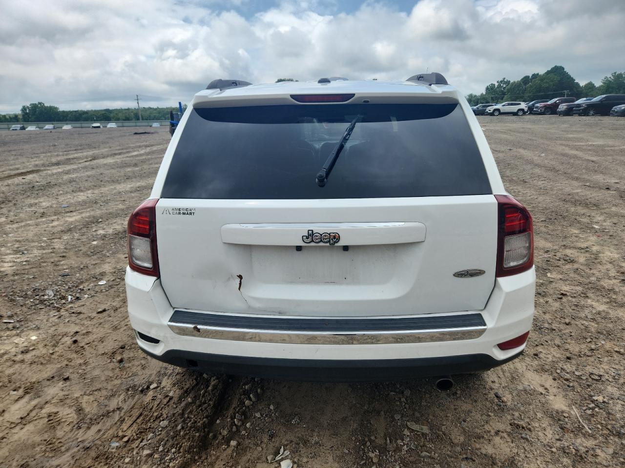 2016 Jeep Compass Latitude VIN: 1C4NJCEA0GD761748 Lot: 64780005