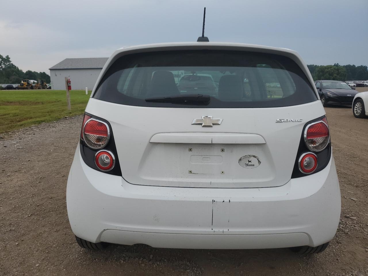 2015 Chevrolet Sonic Ls VIN: 1G1JA6SG4F4198705 Lot: 64728875
