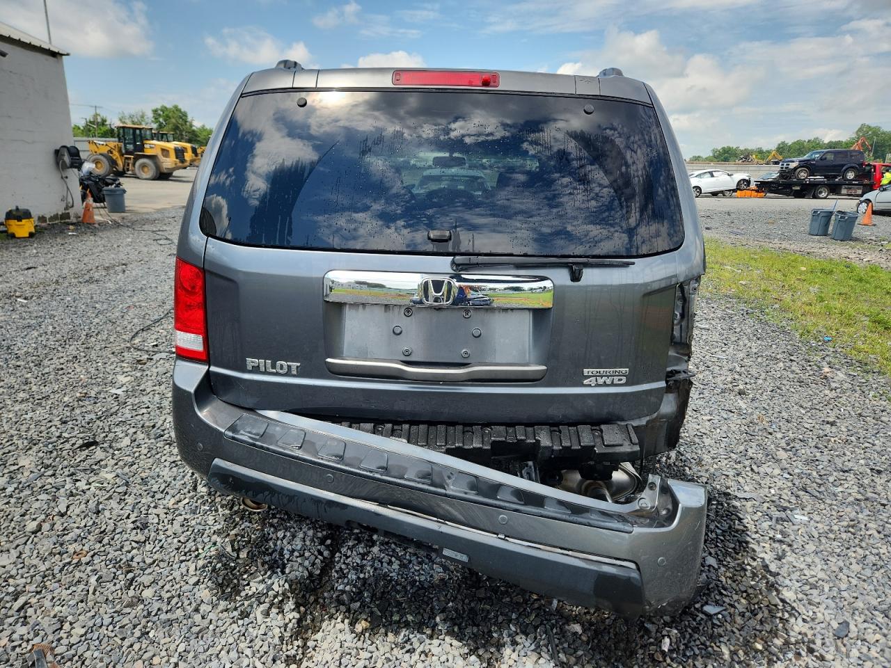 2010 Honda Pilot Touring VIN: 5FNYF4H99AB012534 Lot: 62810345