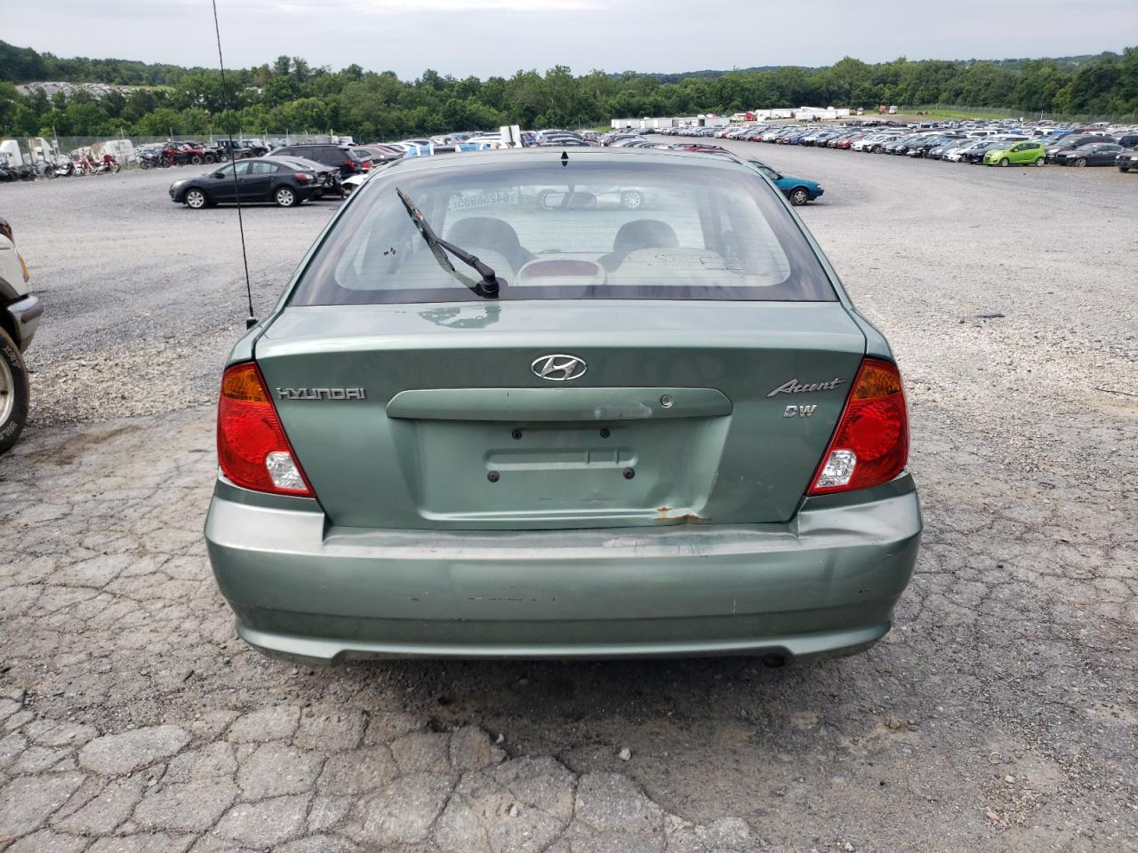2005 Hyundai Accent Gs VIN: KMHCG35C05U325871 Lot: 64258985