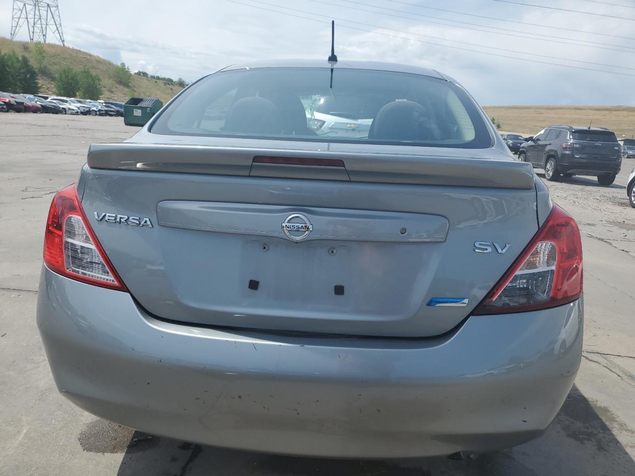 2014 Nissan Versa S VIN: 3N1CN7APXEL823423 Lot: 65329305