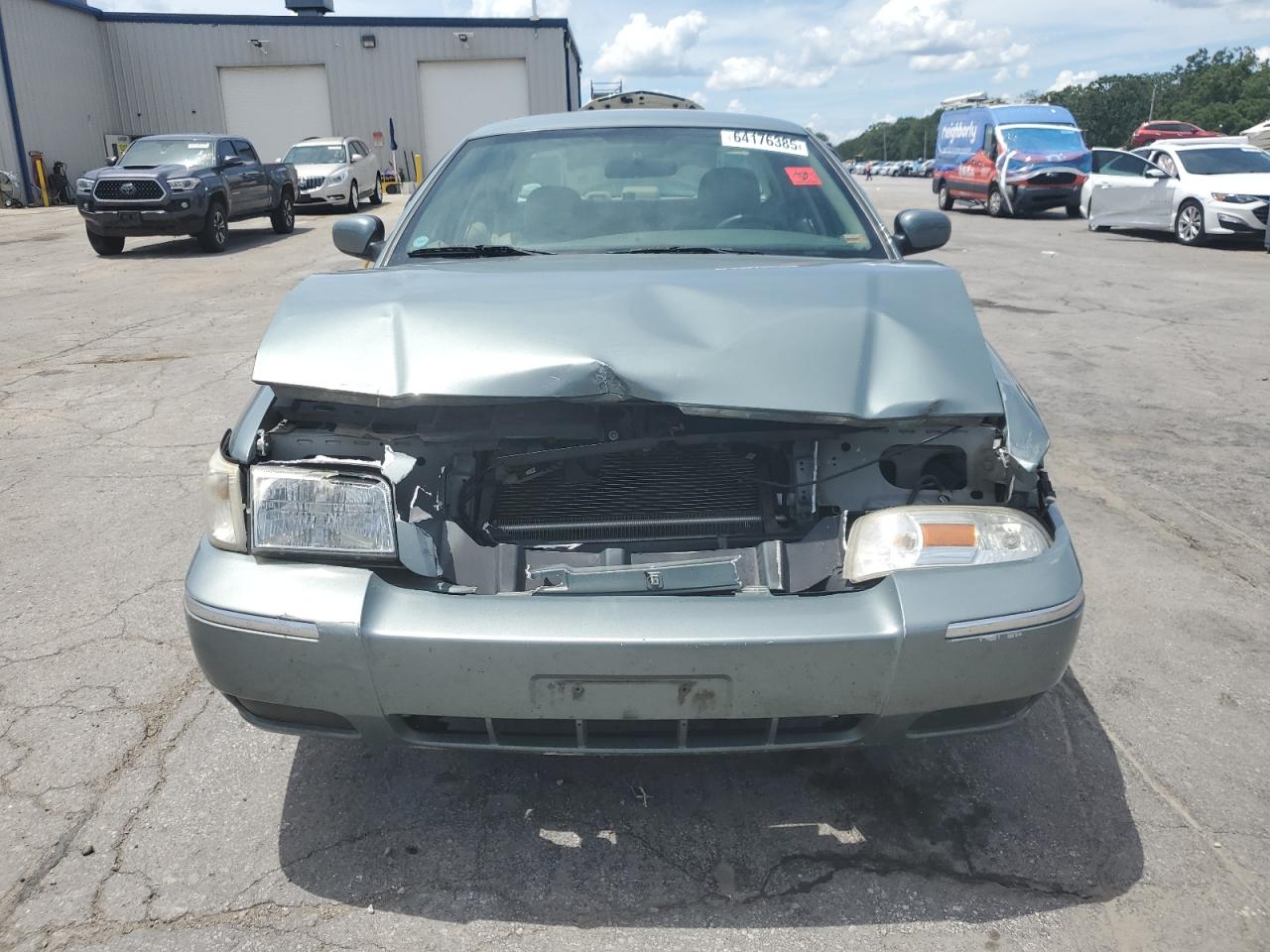 2006 Mercury Grand Marquis Gs VIN: 2MEFM74V16X613542 Lot: 64176385