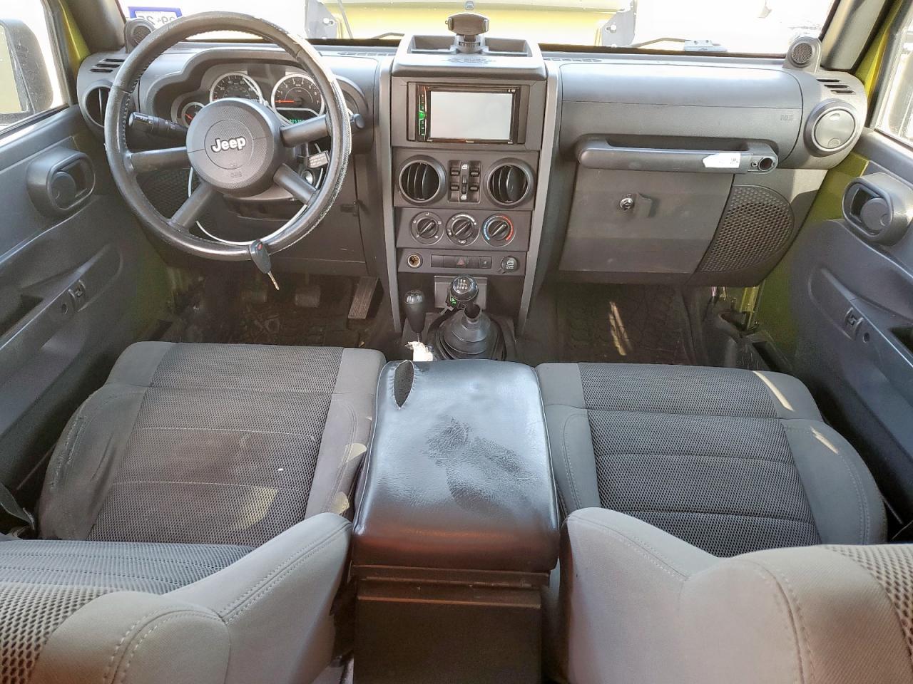 2007 Jeep Wrangler Sahara VIN: 1J4GA59157L152251 Lot: 64802375