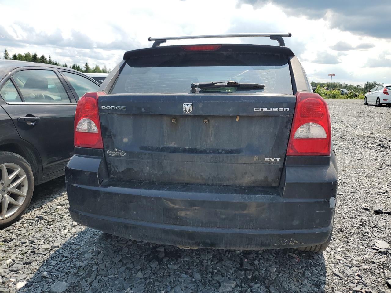 2009 Dodge Caliber Sxt VIN: 1B3HB48A69D223071 Lot: 62867325