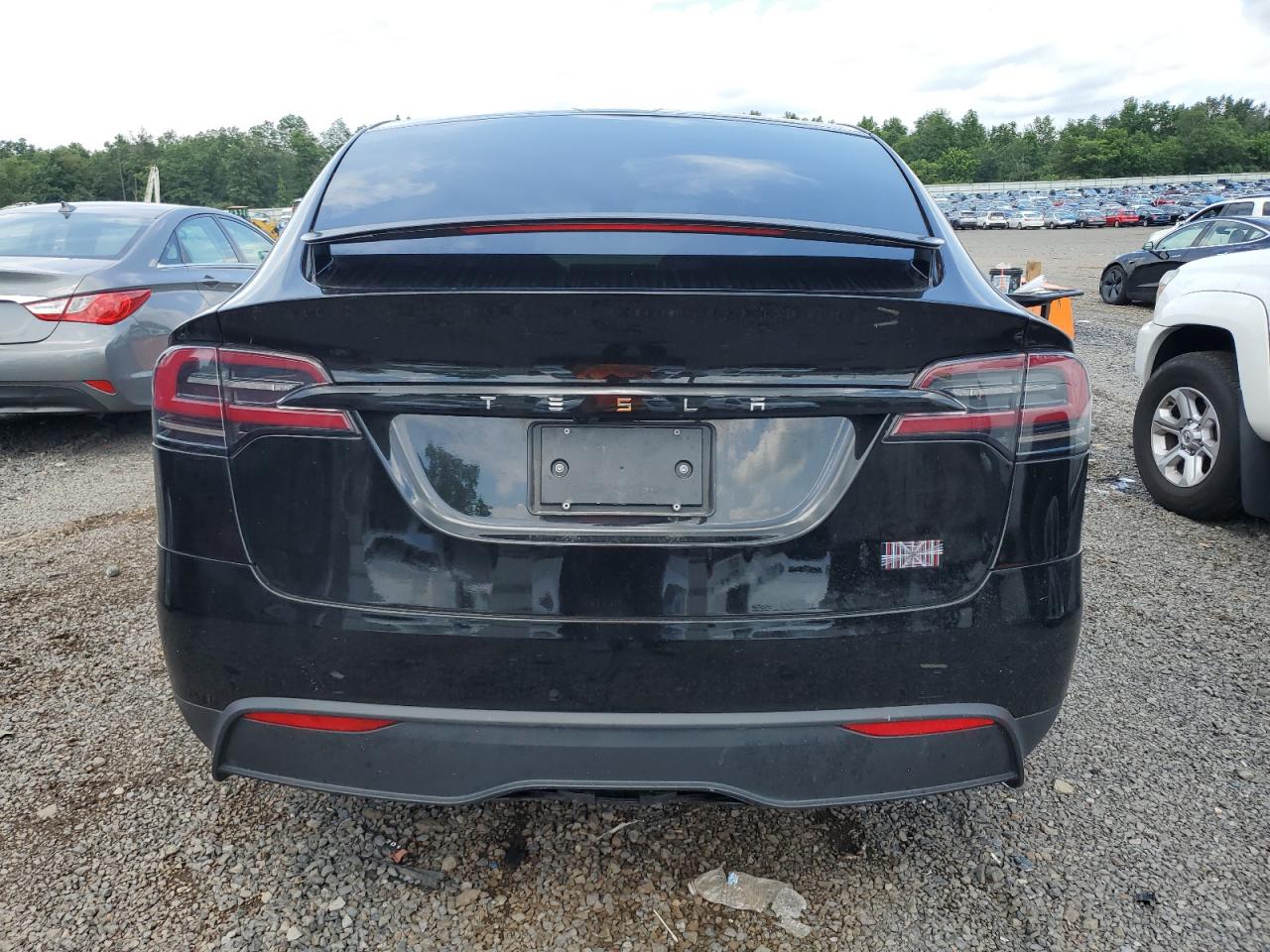 2023 Tesla Model X VIN: 7SAXCBE65PF427400 Lot: 65331215
