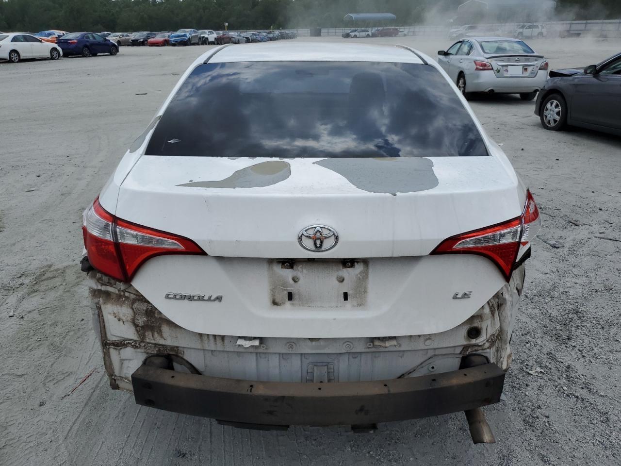 2014 Toyota Corolla L VIN: 5YFBURHE2EP093876 Lot: 66040665