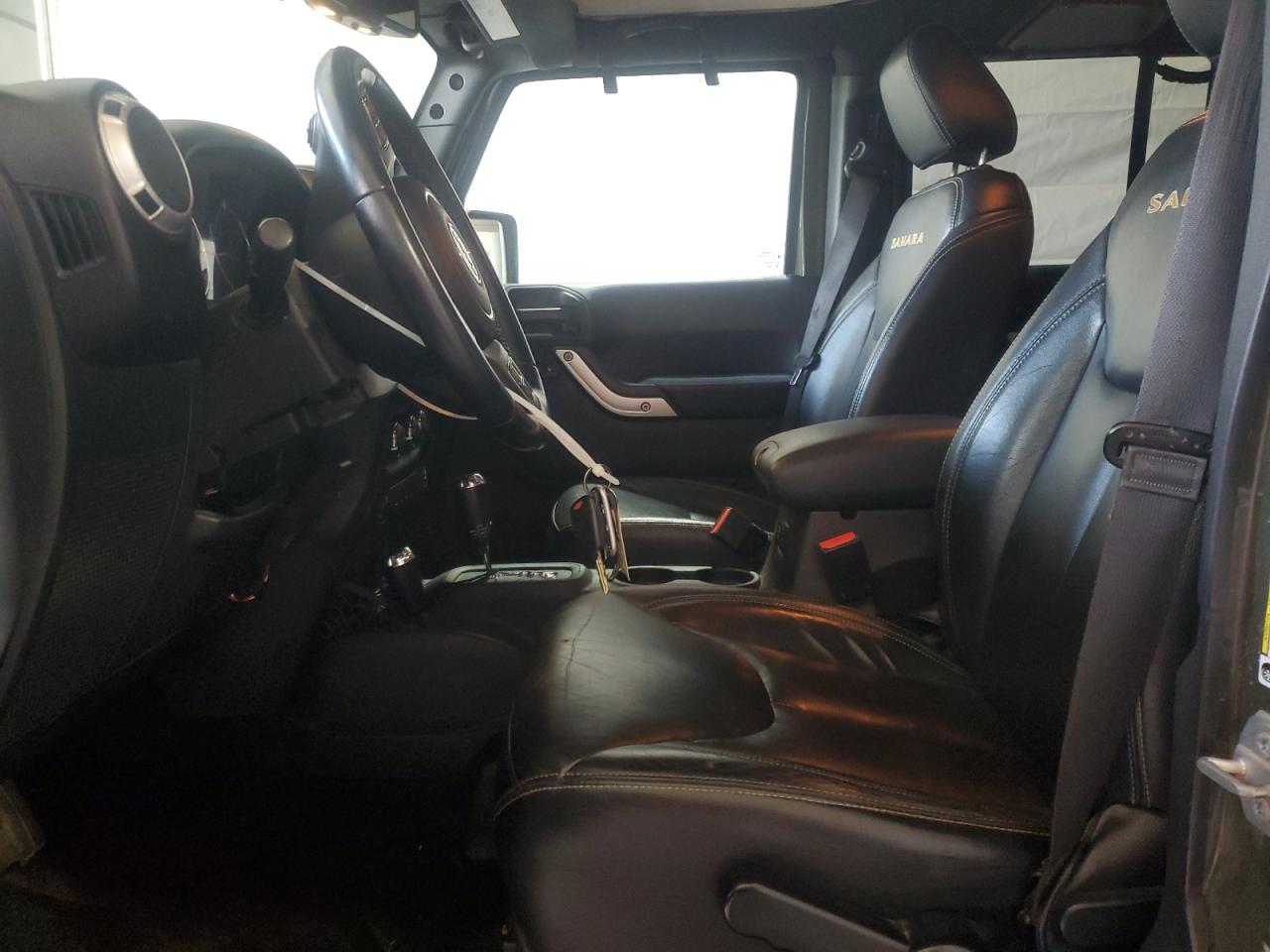 2015 Jeep Wrangler Unlimited Sahara VIN: 1C4BJWEGXFL774665 Lot: 62682345