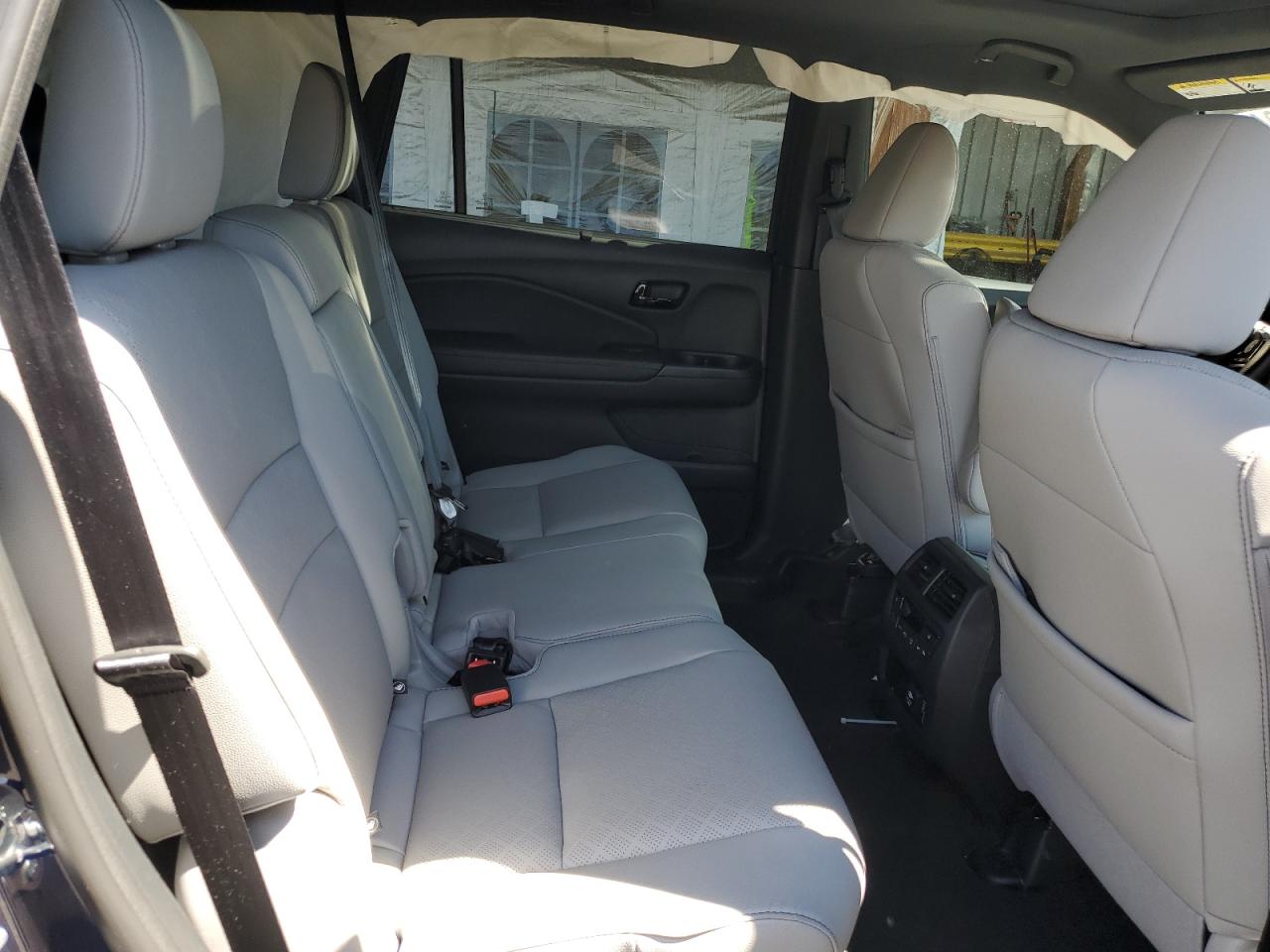 2023 Honda Passport Elite VIN: 5FNYF8H02PB017947 Lot: 63519435