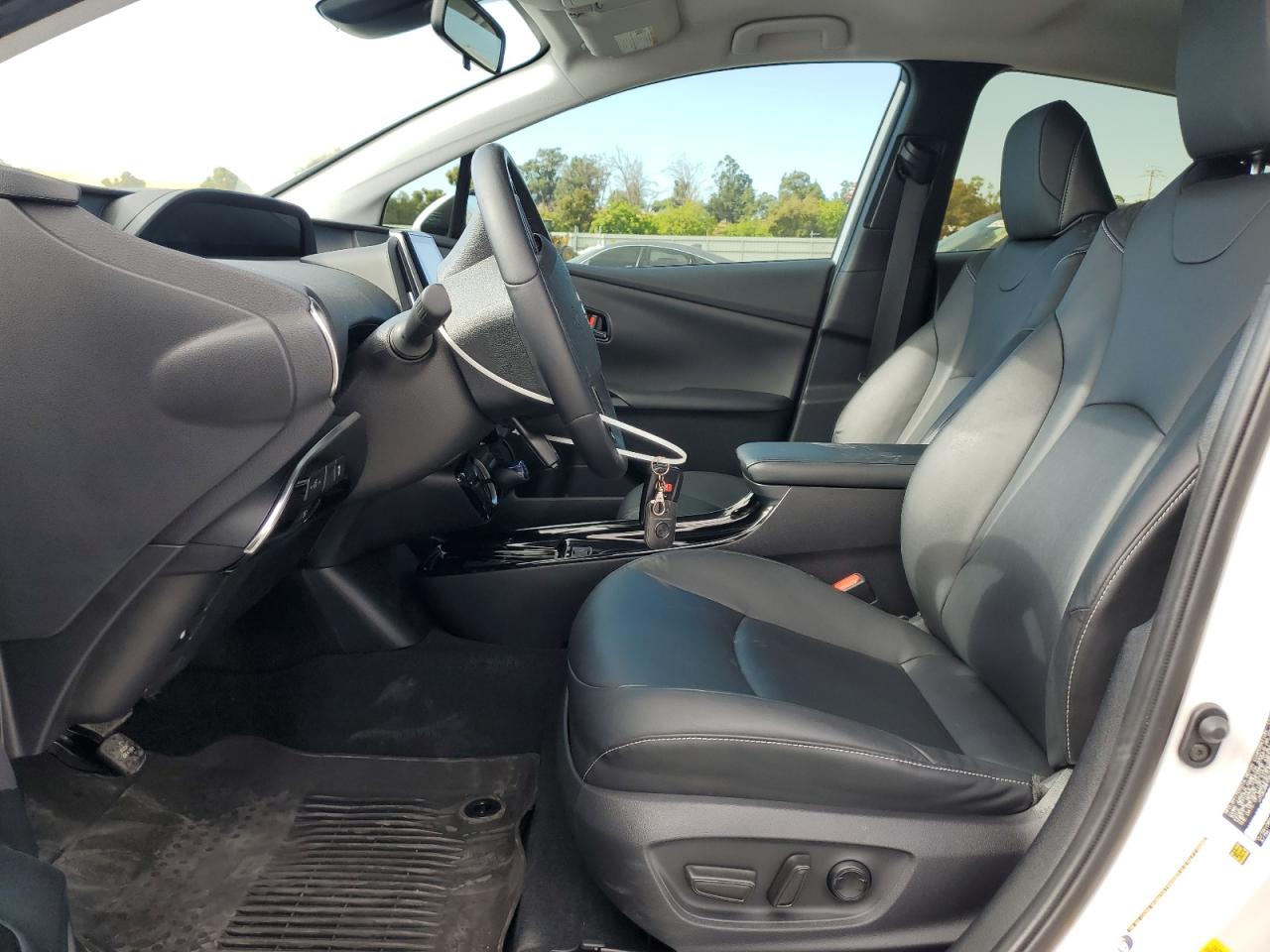 2021 Toyota Prius Prime Le VIN: JTDKAMFPXM3176091 Lot: 64245815