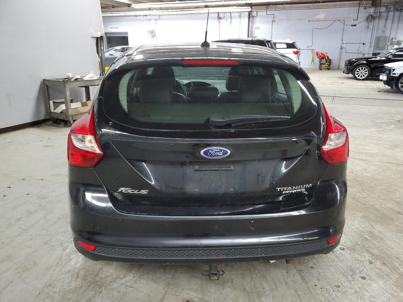 2014 Ford Focus Titanium VIN: 1FADP3N24EL192351 Lot: 65564835