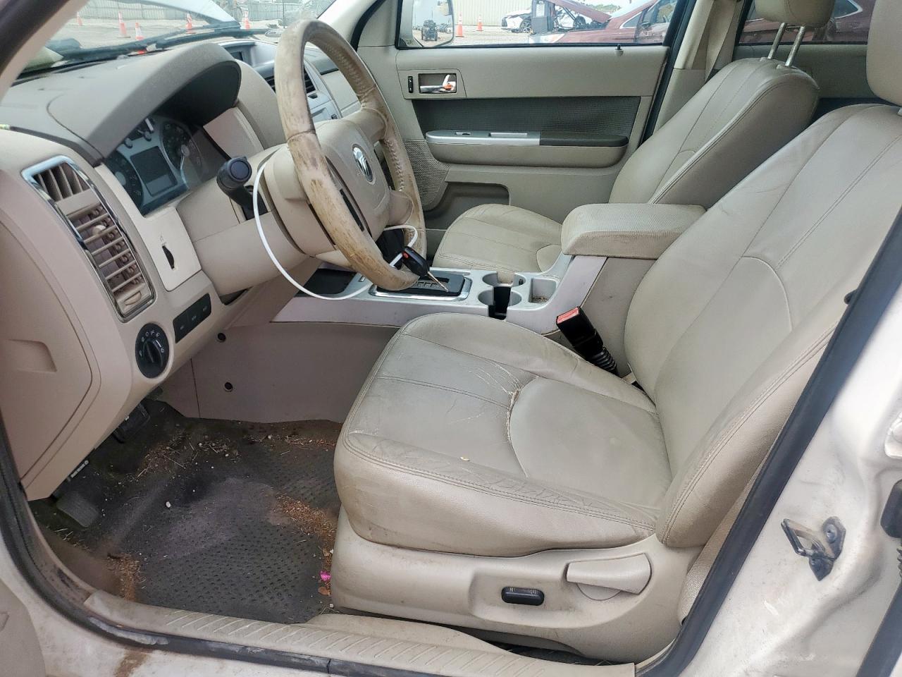 2010 Mercury Mariner Premier VIN: 4M2CN8HG7AKJ29917 Lot: 63306425