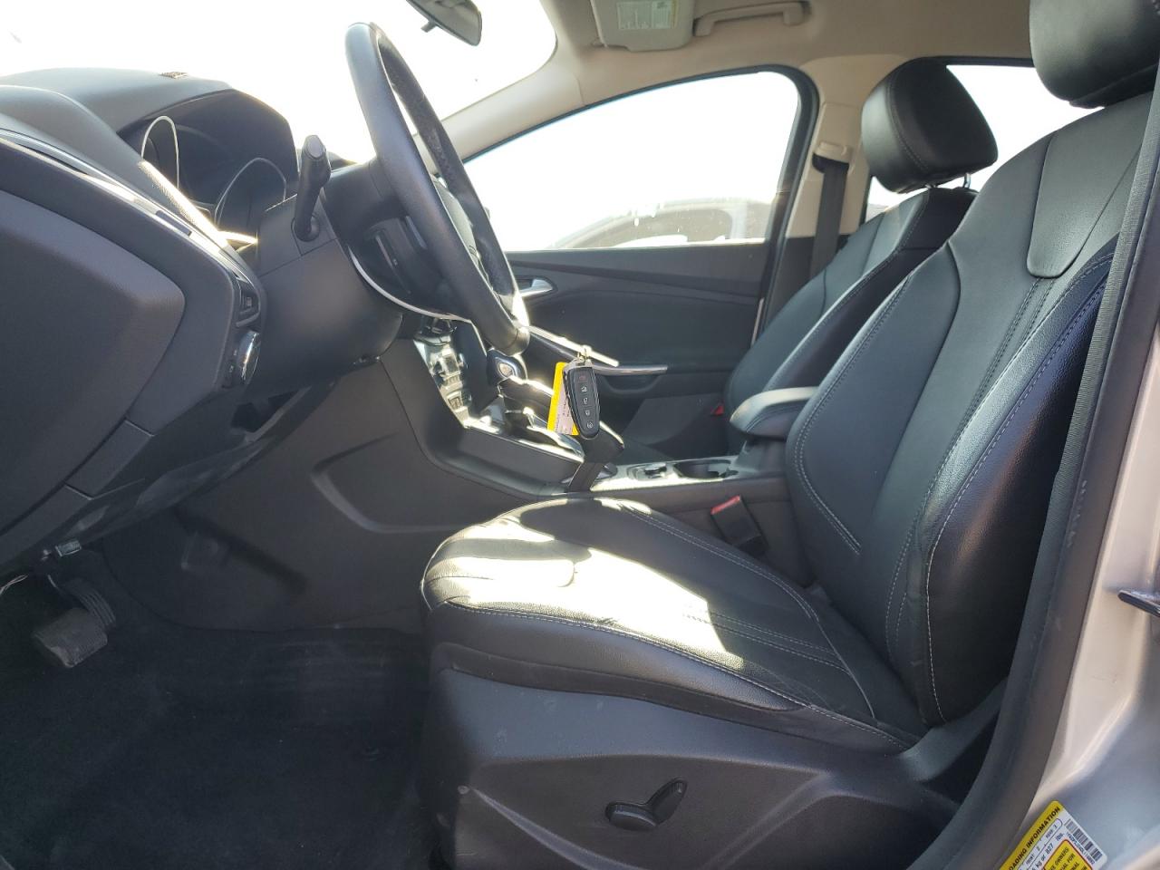 2013 Ford Focus Titanium VIN: 1FADP3J24DL116892 Lot: 65040065