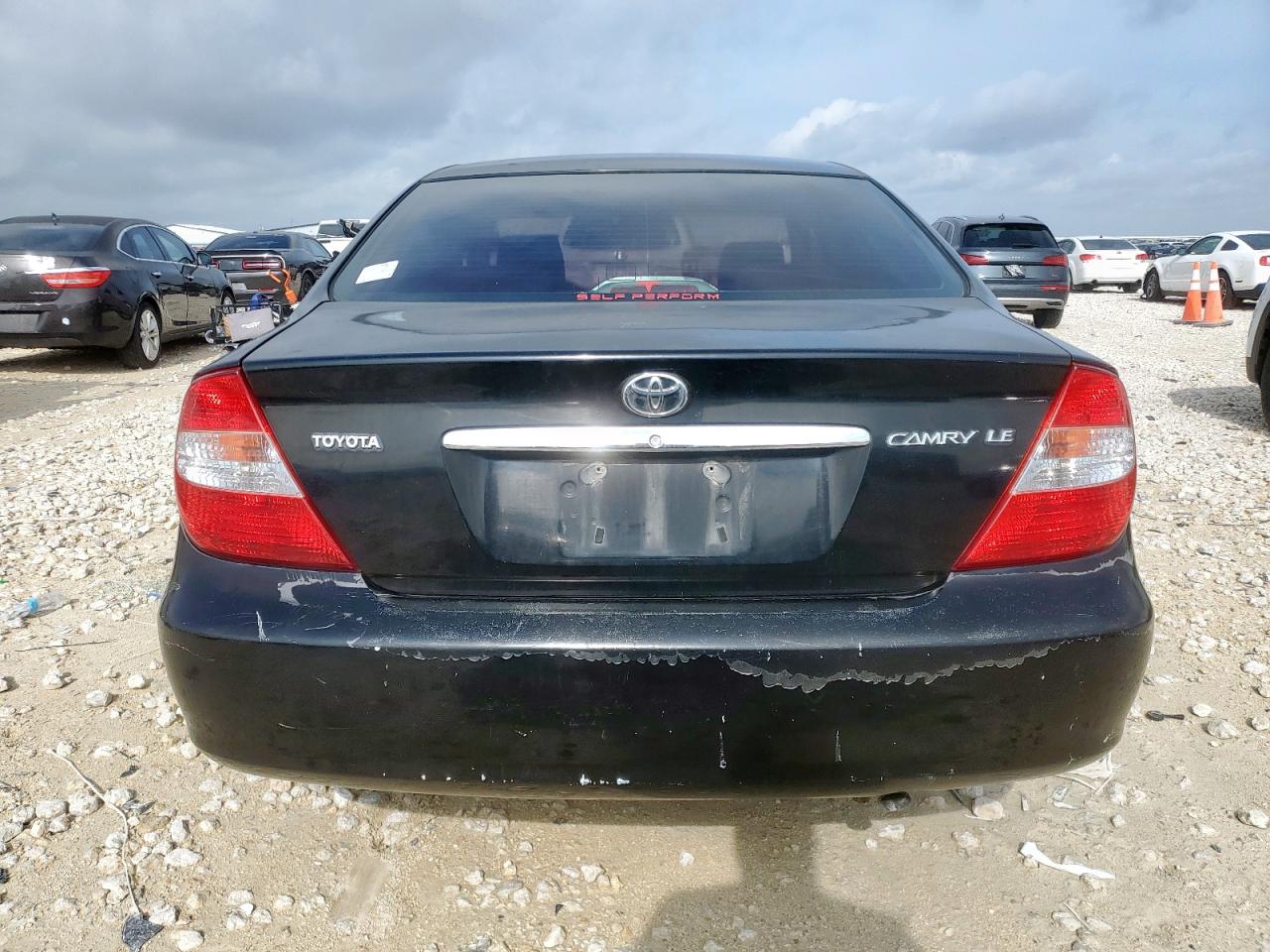 2003 Toyota Camry Le VIN: JTDBE32K330143135 Lot: 64695415