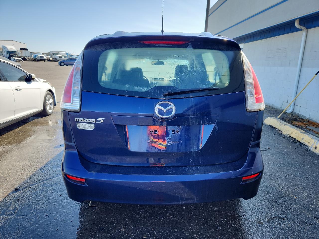 2009 Mazda 5 VIN: JM1CR293590355710 Lot: 65020535