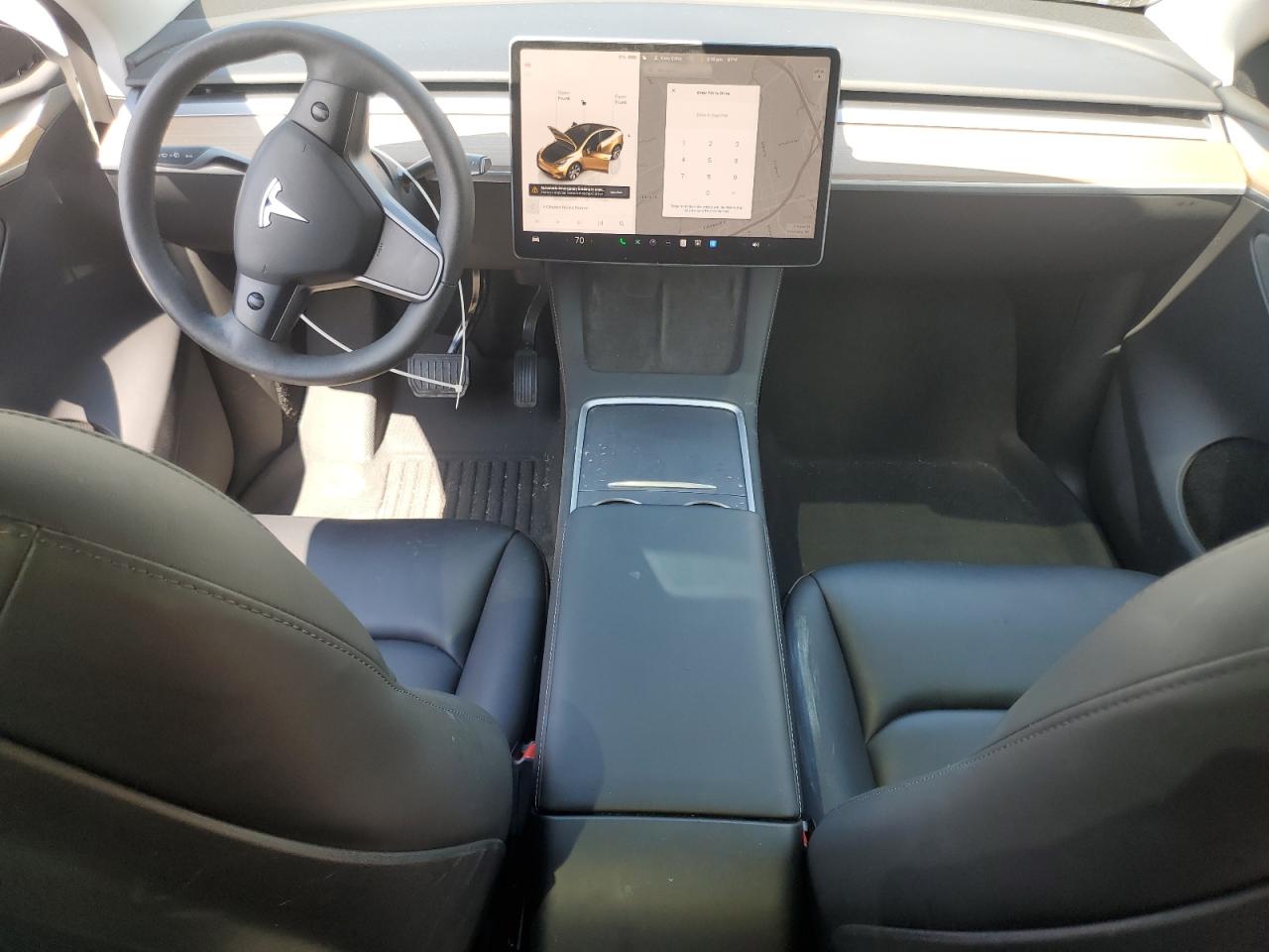 2023 Tesla Model Y VIN: 7SAYGDEE9PA099570 Lot: 67015335