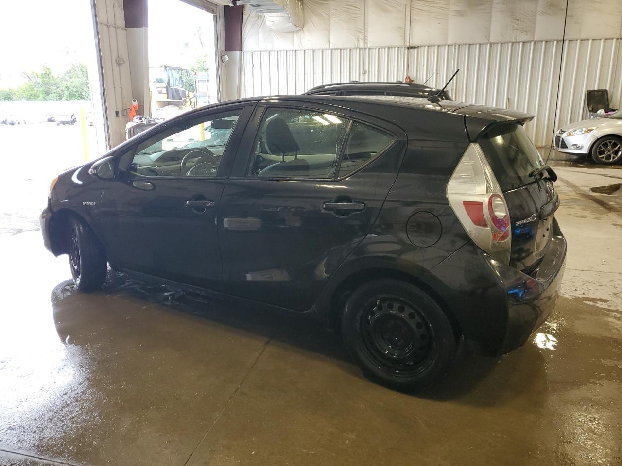 2014 Toyota Prius C VIN: JTDKDTB31E1570628 Lot: 65325235