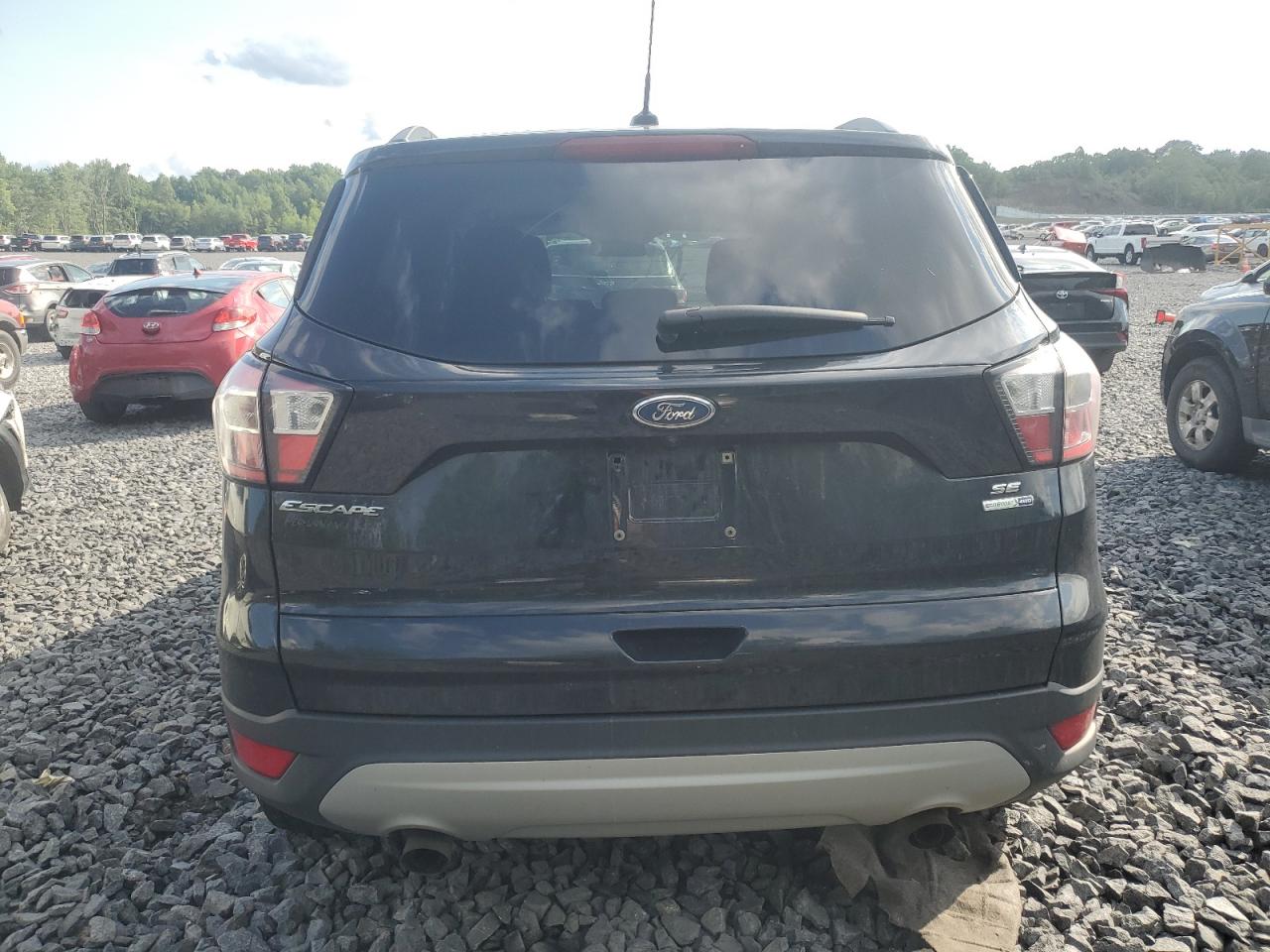 2018 Ford Escape Se VIN: 1FMCU9GD3JUA12423 Lot: 64517805